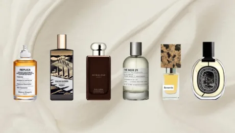 Discovery Set vid YOU WILL FEEL yak za odyn boks znayty sviy aromat Six perfume bottles lined up on a cream fabric background, including Replica, Italian Leather, Jo Malone, Thé Noir 29, Baraonda, and Diptyque (row of fragrances).