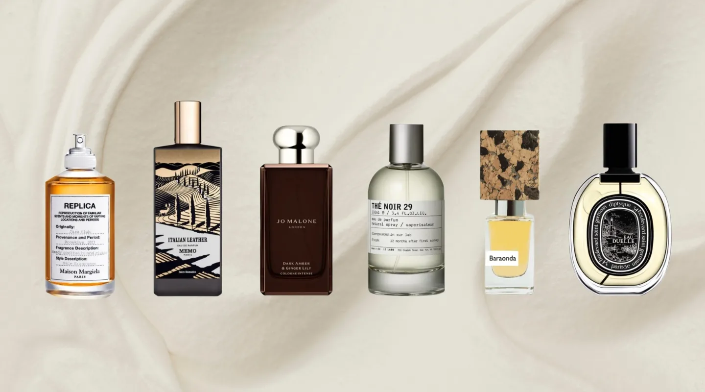 Discovery Set vid YOU WILL FEEL yak za odyn boks znayty sviy aromat Six perfume bottles lined up on a cream fabric background, including Replica, Italian Leather, Jo Malone, Thé Noir 29, Baraonda, and Diptyque (row of fragrances).